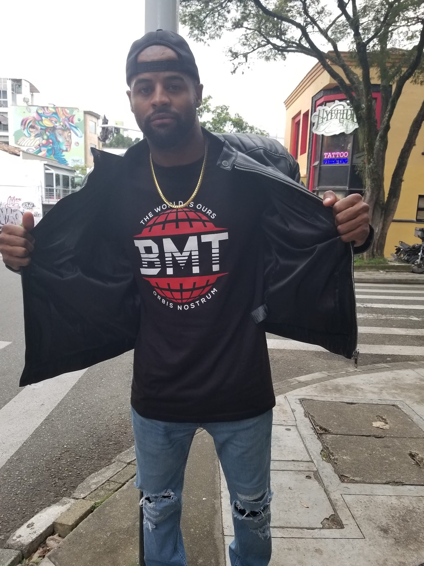 BMT RED Globe Logo T-Shirt — “The World Is Ours” Graphic Tee